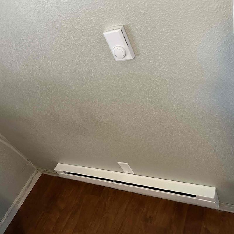 Baseboard heater and wall thermostat installation