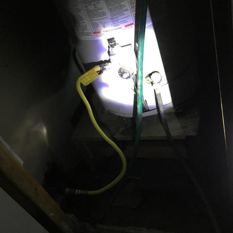 Water heater gas line with replaced valve and fittings