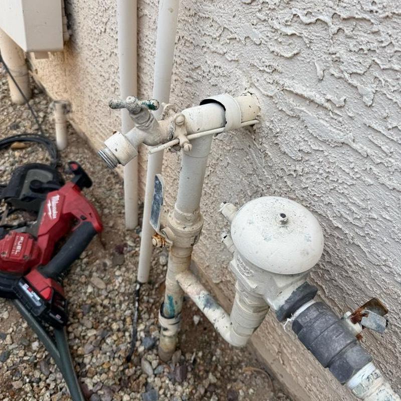 Leaking outdoor hose bibs and plumbing valves on wall Leaking outdoor hose bibs and plumbing valves on wall
