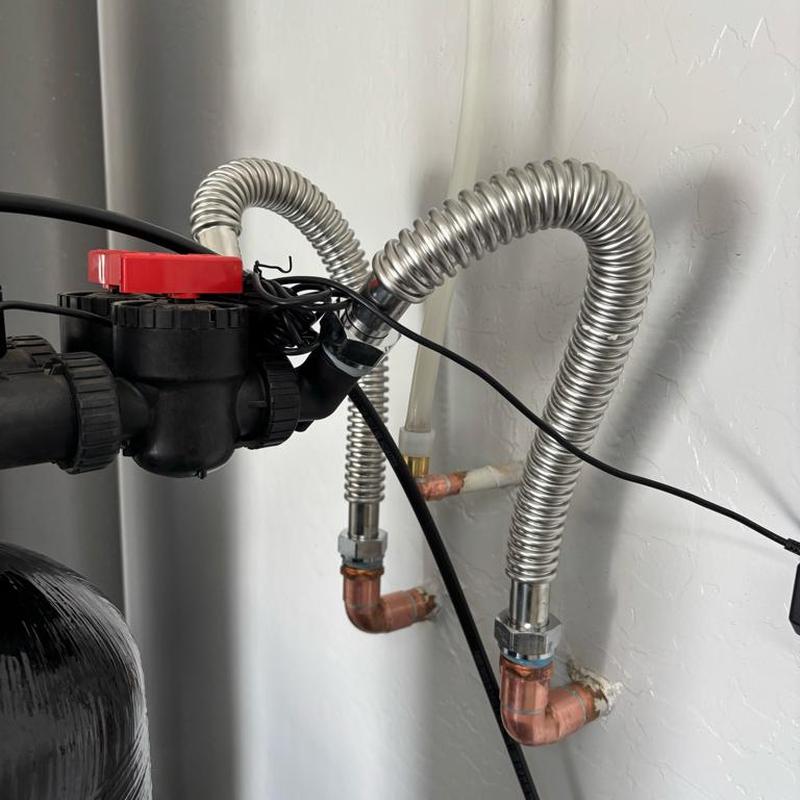 Water softener with new fittings and flex lines Water softener with new fittings and flex lines