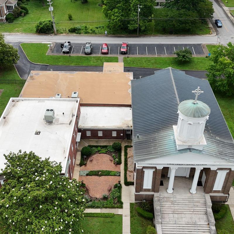 PVC roof with ponding water on church flat roof