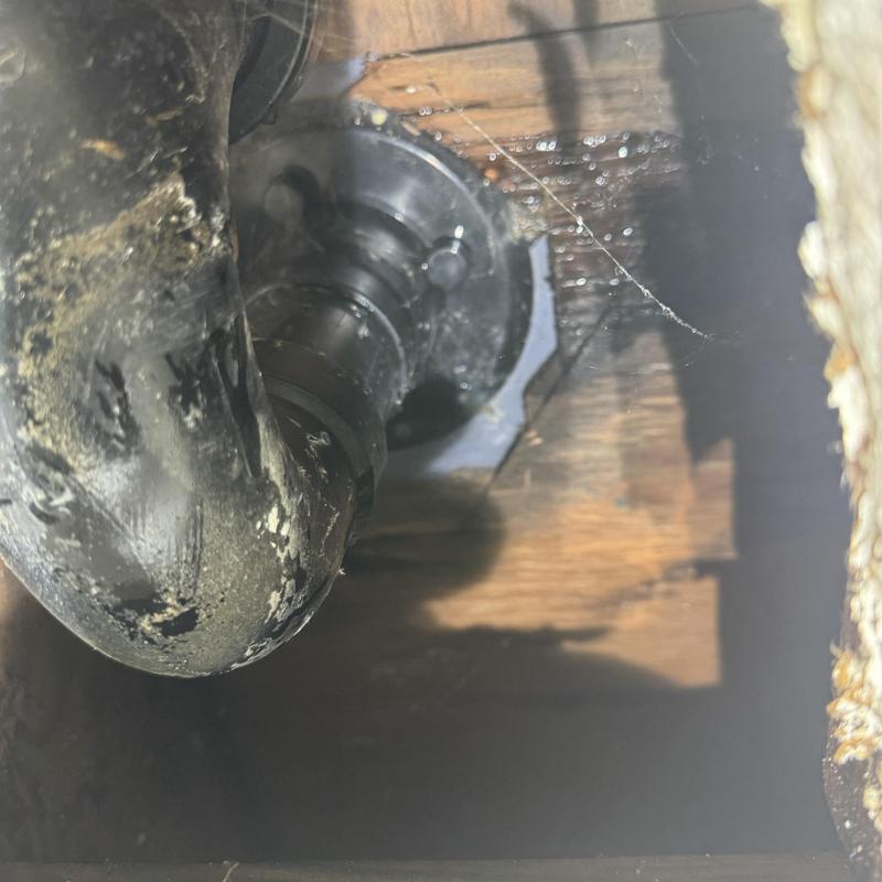 Drain pipe with hair blockage removal inside wall cavity