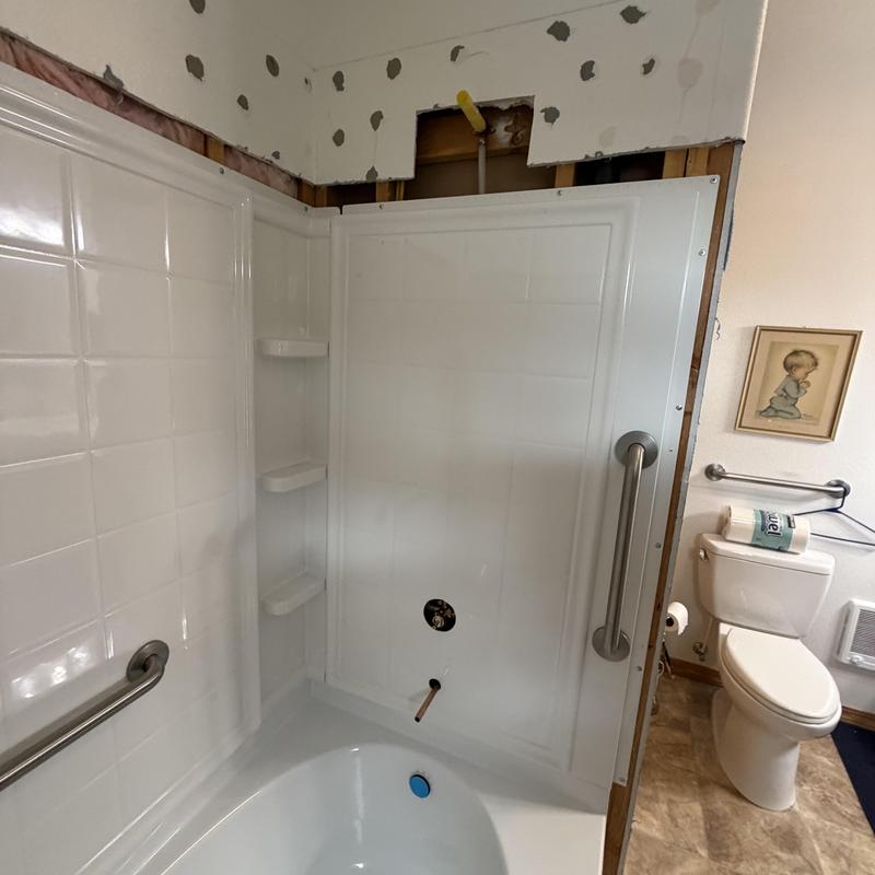 Kohler Sterling bathtub and surround installation progress