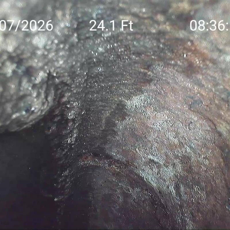 Cast iron sewer line close-up with corrosion and breaks Cast iron sewer line close-up with corrosion and breaks