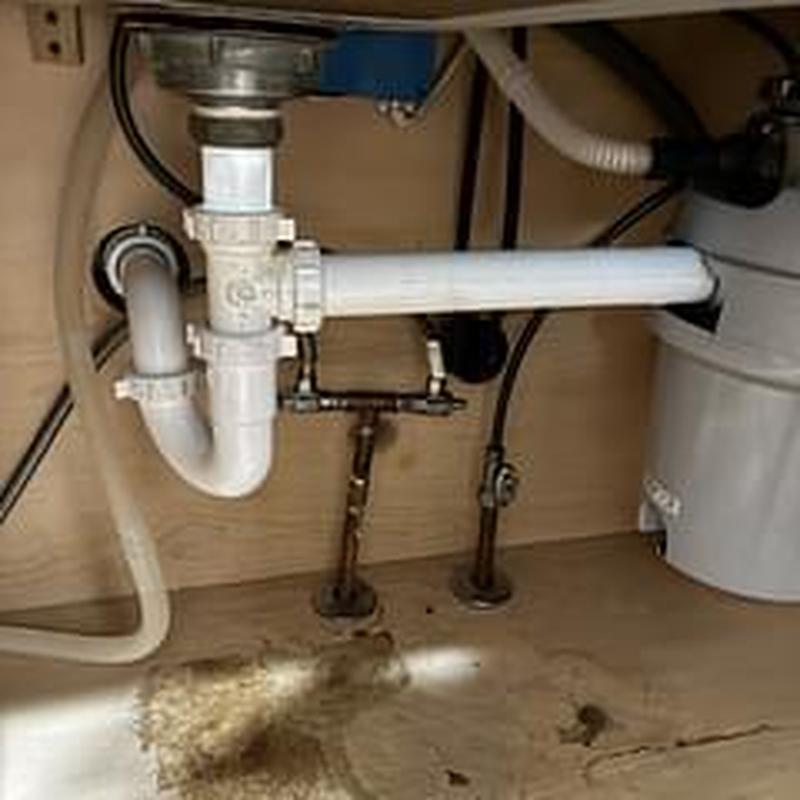 Garbage disposal drain with new plumbing pipes