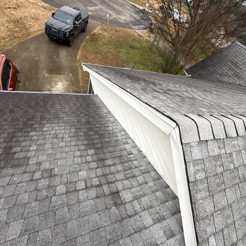 Asphalt shingle roof with hail damage inspection