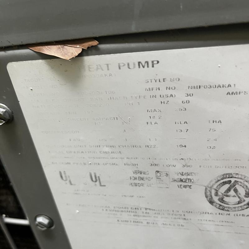 Heat pump system label with model and specs