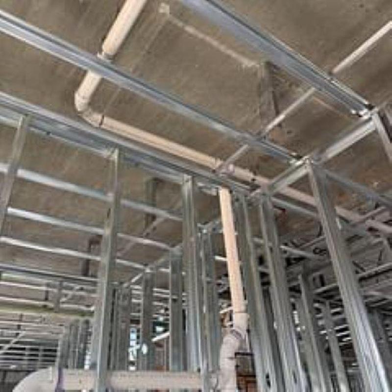 Sanitary and water lines rough-in with metal framing