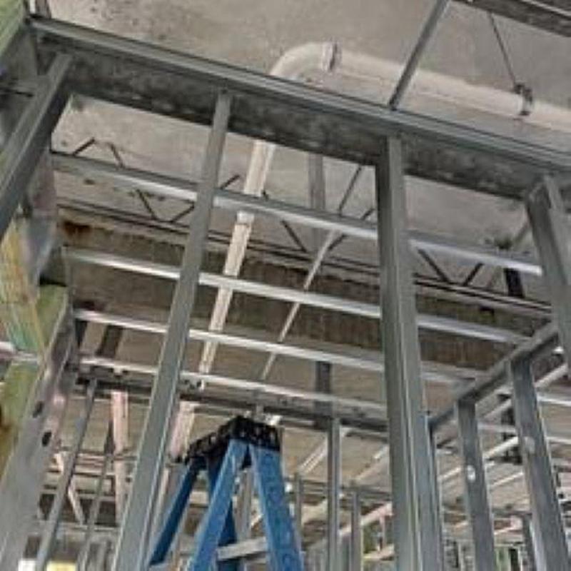 Sanitary and water lines installed in metal framing