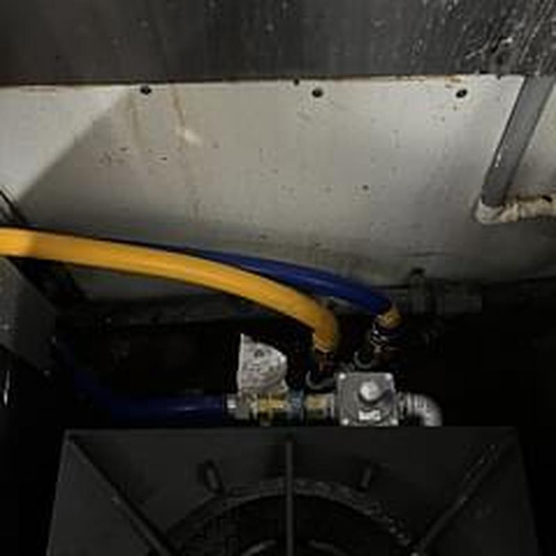 Commercial kitchen gas flex hose with new tee and shutoff