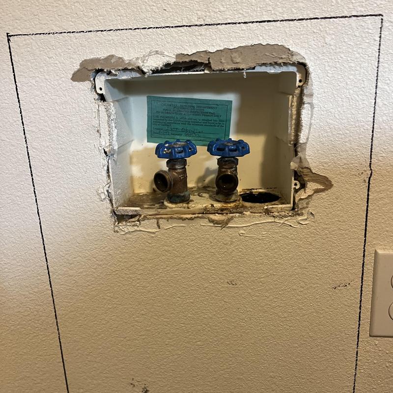 Washer box with quarter-turn valves and wall damage