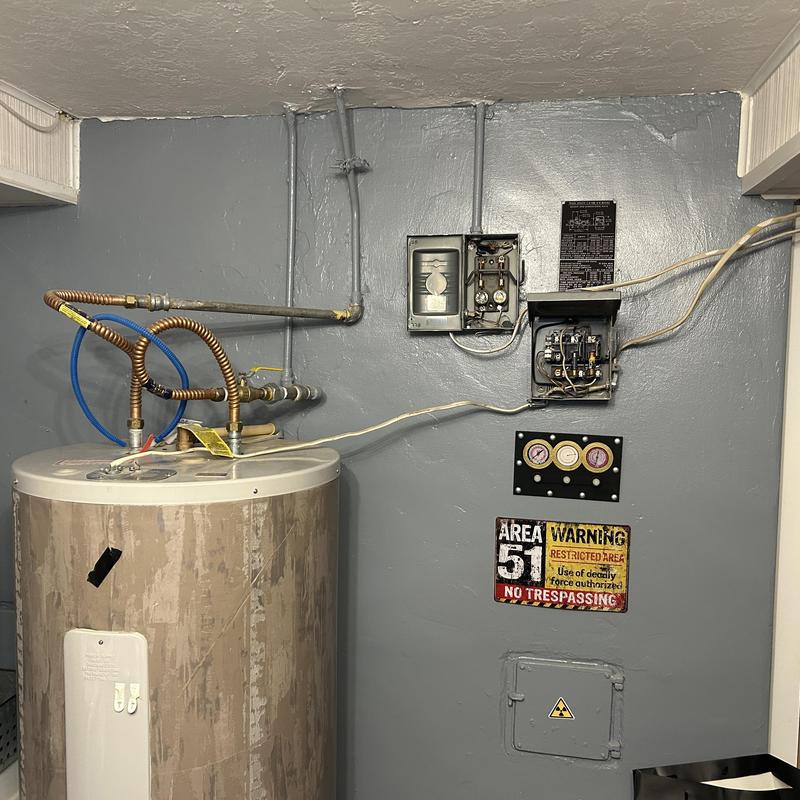 Water heater electrical disconnect and wiring setup