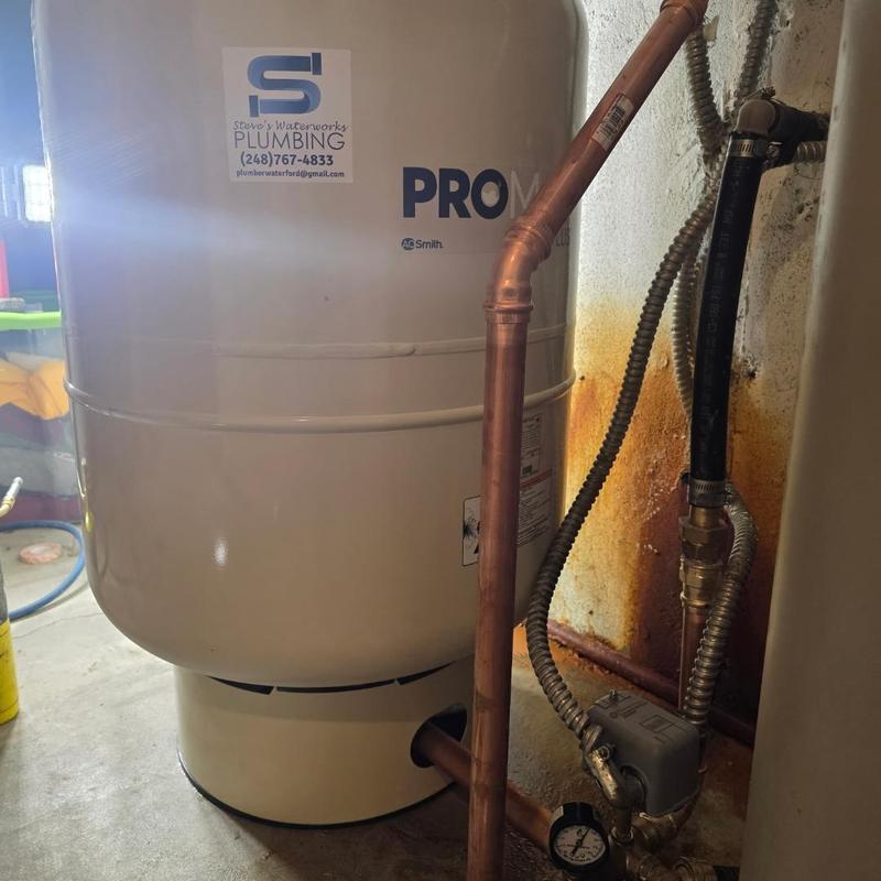 Bladder tank with copper piping and pressure switch