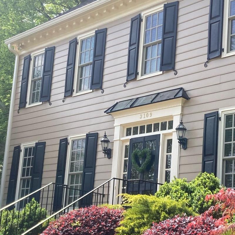 Exterior siding and shutters on residential home Exterior siding and shutters on residential home