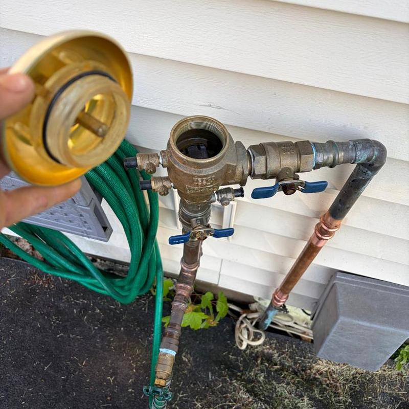 Vacuum breaker and irrigation line valves outdoors