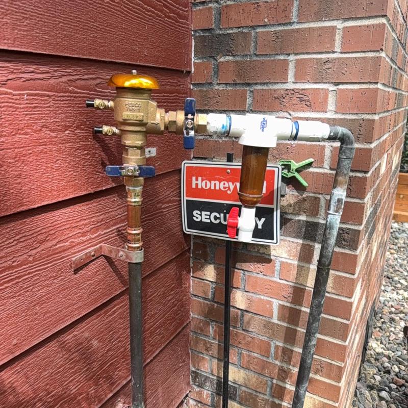 Irrigation vacuum breaker and filter installation outdoors