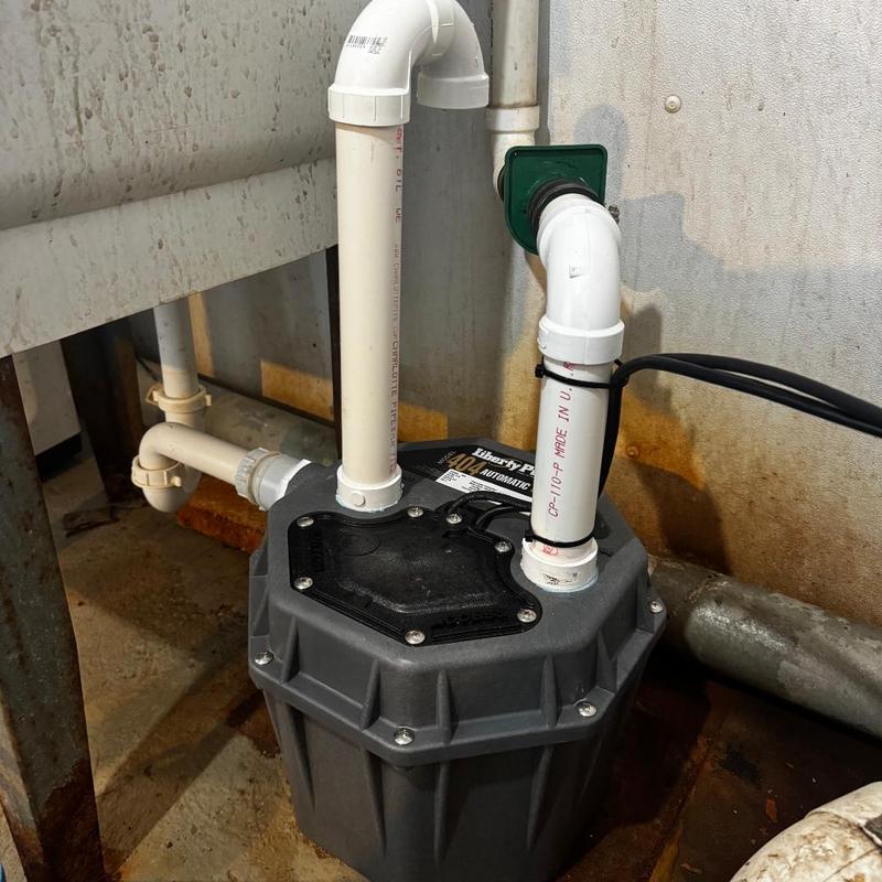 Liberty laundry pump with PVC piping installation