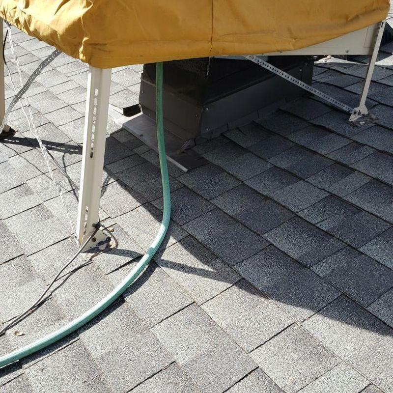 Swamp cooler base and shingle roof inspection detail Swamp cooler base and shingle roof inspection detail