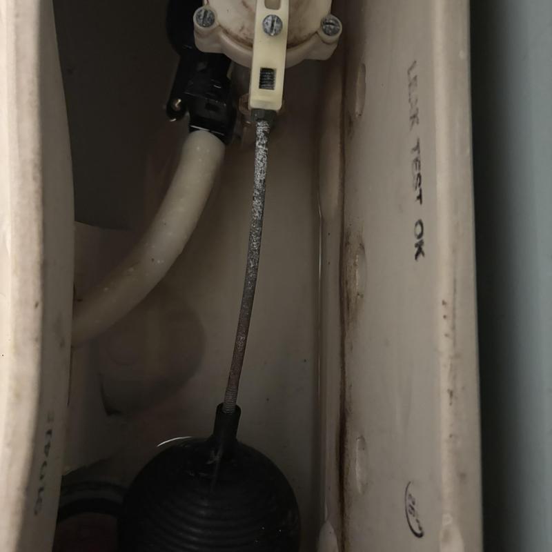 One-piece toilet fill valve and flapper replacement inside tank