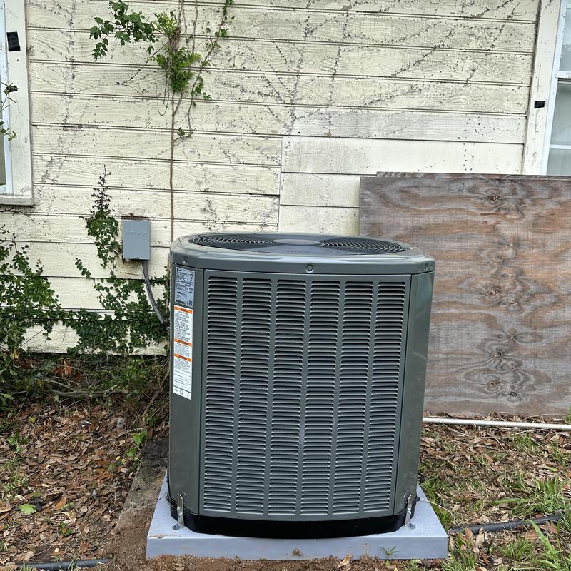 14 SEER Trane outdoor AC unit on concrete pad 14 SEER Trane outdoor AC unit on concrete pad