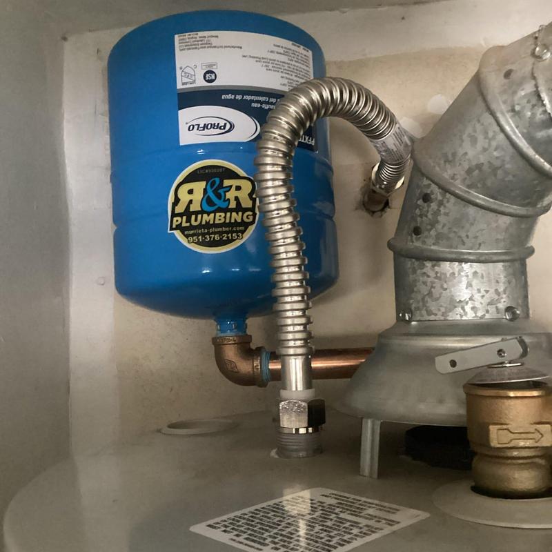 Water heater expansion tank with brass fittings installation
