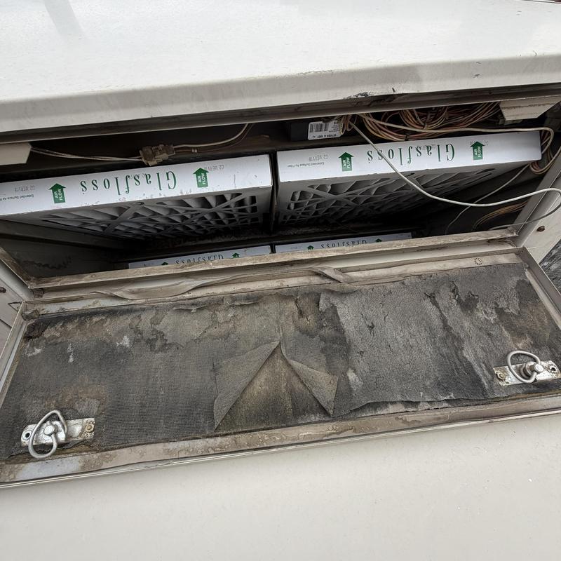 Air handler filter compartment with dirty filter pad Air handler filter compartment with dirty filter pad