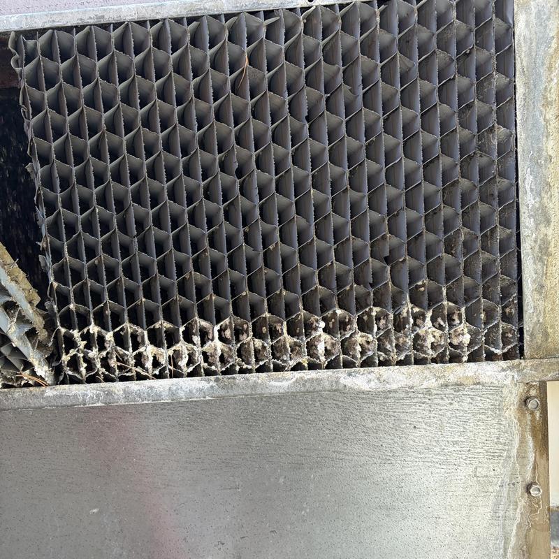 Evaporator coil honeycomb fins with corrosion buildup Evaporator coil honeycomb fins with corrosion buildup