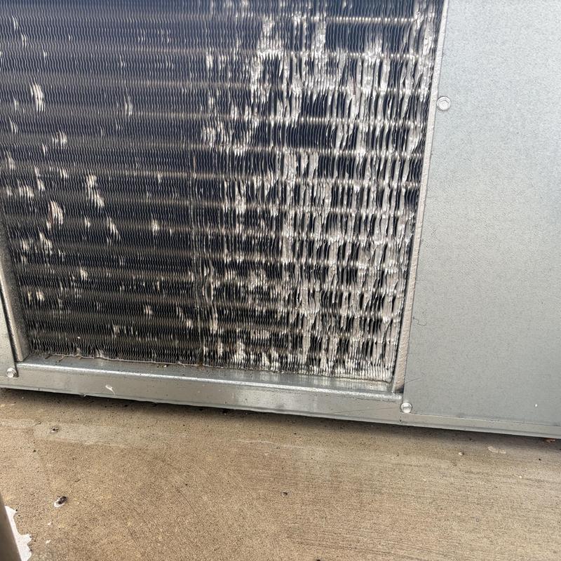 Air conditioner condenser coil with bent fins and damage Air conditioner condenser coil with bent fins and damage