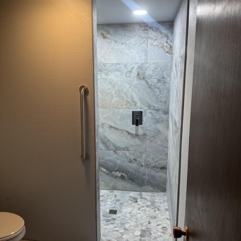 Shower tile walls and hexagonal mosaic floor tiles Shower tile walls and hexagonal mosaic floor tiles
