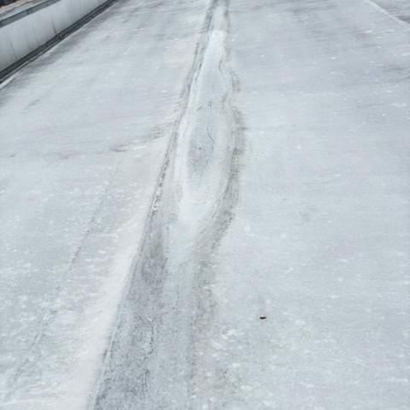 Commercial flat roof membrane showing active deterioration Commercial flat roof membrane showing active deterioration