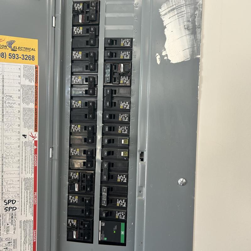 Main electrical panel with installed whole home surge protector