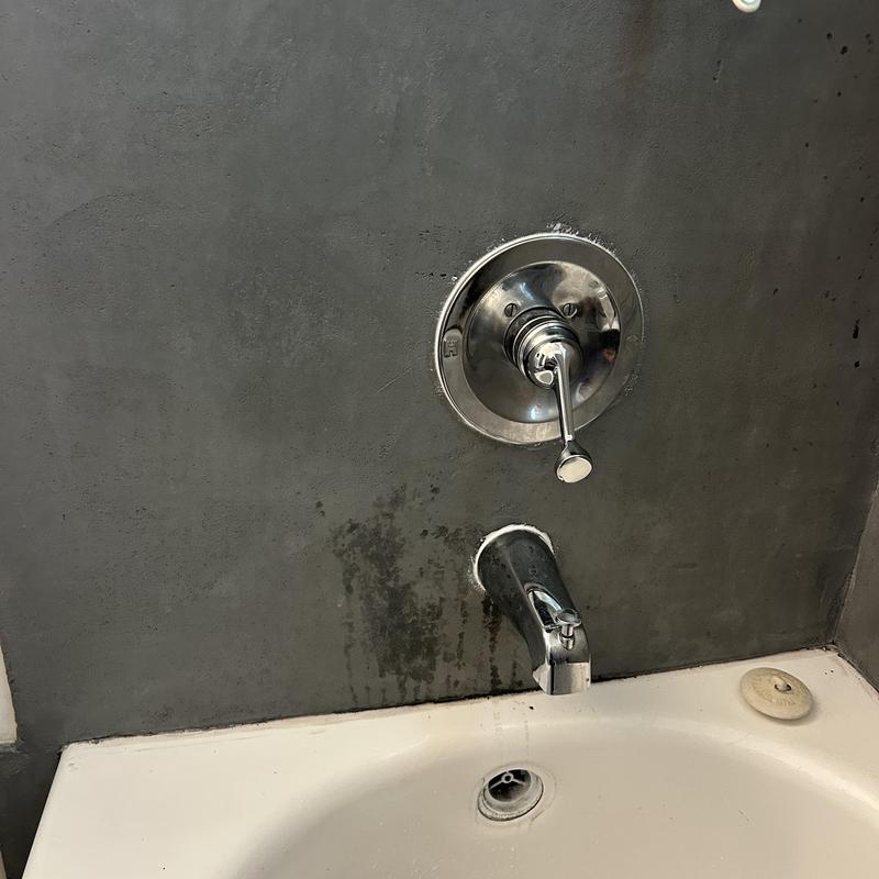 Shower valve handle and faucet with wall stains
