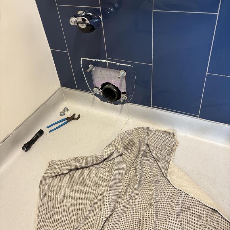 Toilet flange removal with tools and protective cloth Toilet flange removal with tools and protective cloth