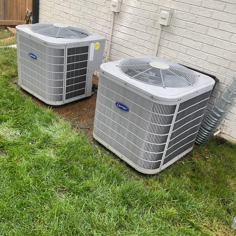 Condenser units outdoors with system maintenance checks Condenser units outdoors with system maintenance checks