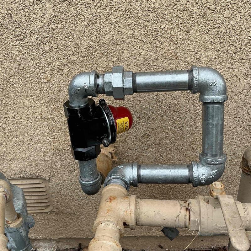 Seismic gas shut-off valve with metal piping installation
