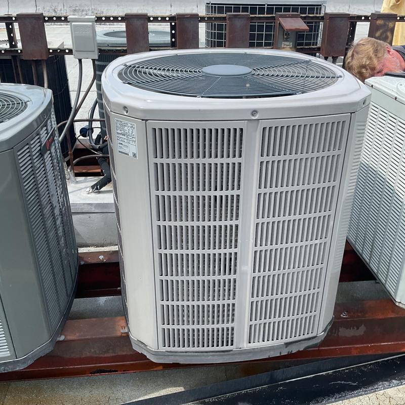 Condenser coil unit on rooftop HVAC system inspection Condenser coil unit on rooftop HVAC system inspection