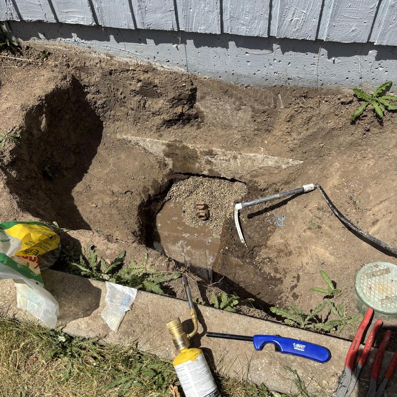 Main waterline excavation and replacement near foundation