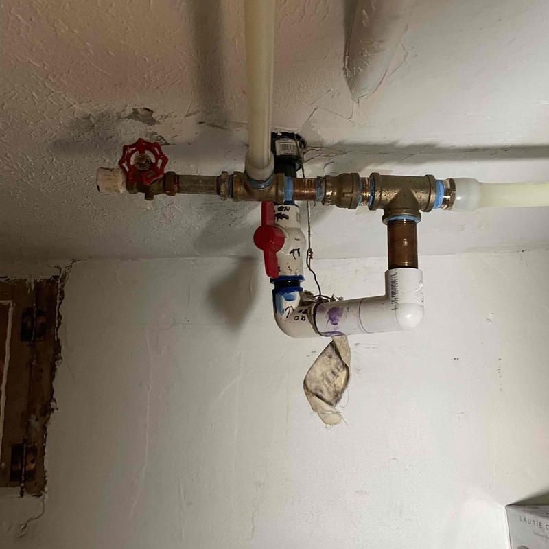 Bathroom water supply piping with shut off valves installed Bathroom water supply piping with shut off valves installed