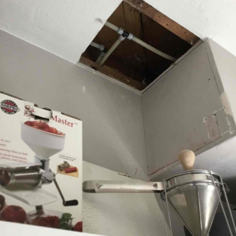 Potable water repiping with ceiling access hole cut Potable water repiping with ceiling access hole cut
