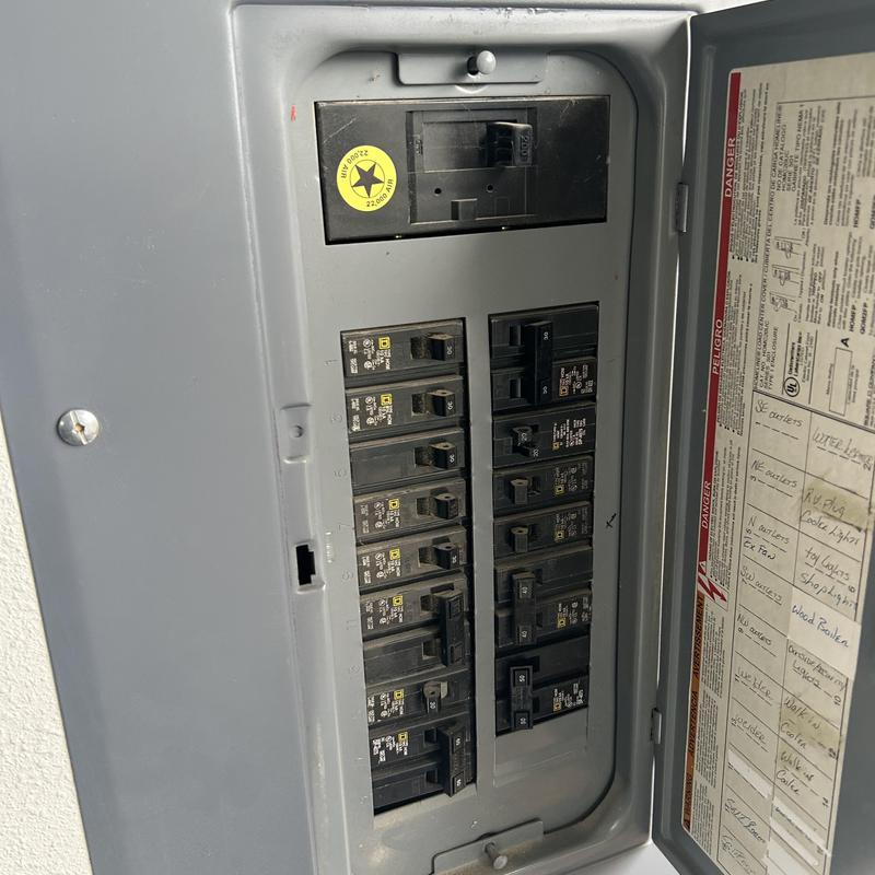 Electric panel with installed 50 amp EV charger breaker