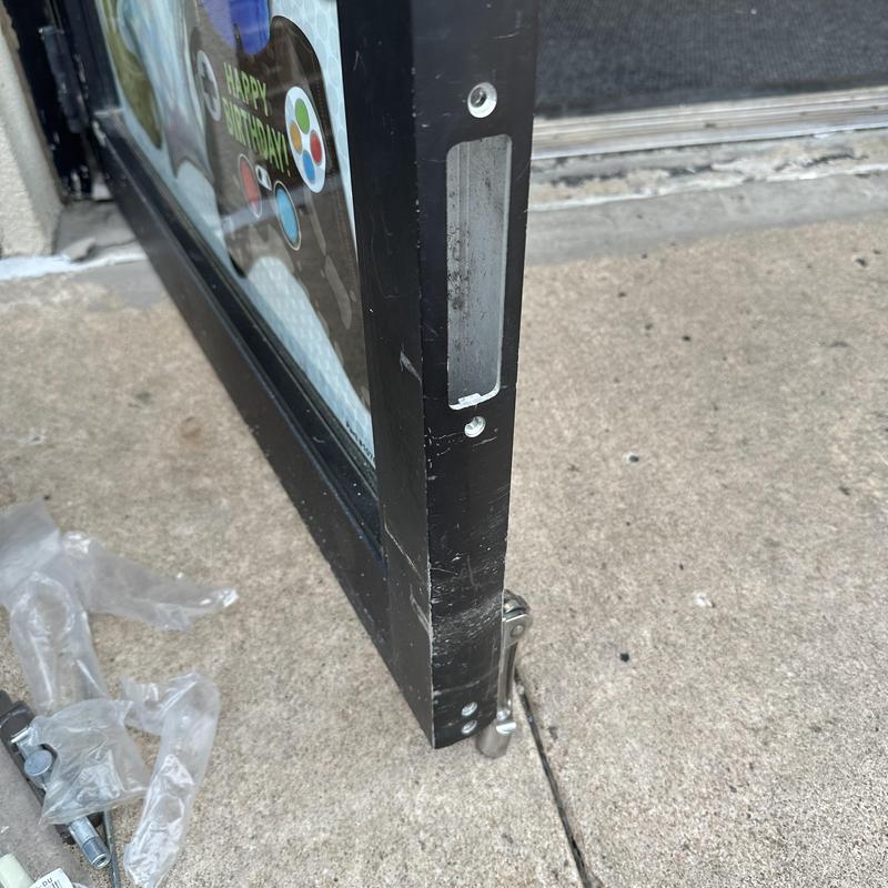 Flush bolt on black door replacing hardware