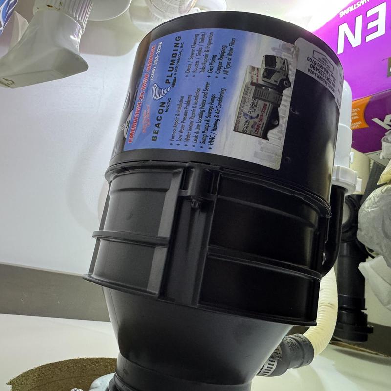 Garbage disposal installation under kitchen sink