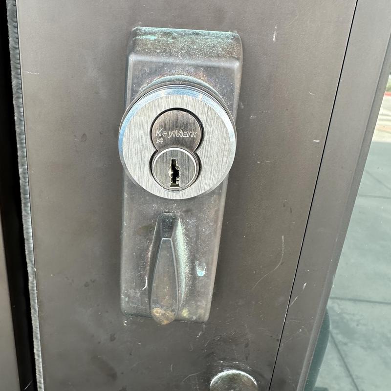 KeyMark lock core and housing on commercial door