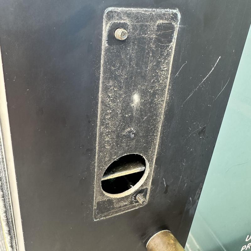Commercial door lock housing with exposed core cavity