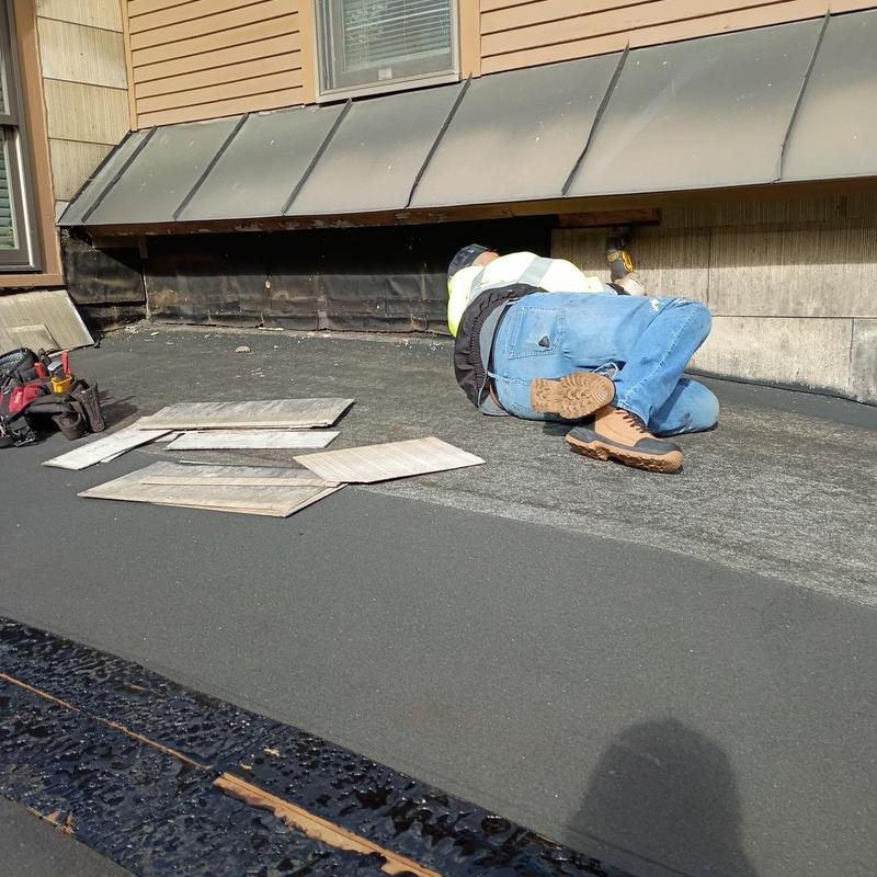 EPDM rubber roof installation on flat roof EPDM rubber roof installation on flat roof
