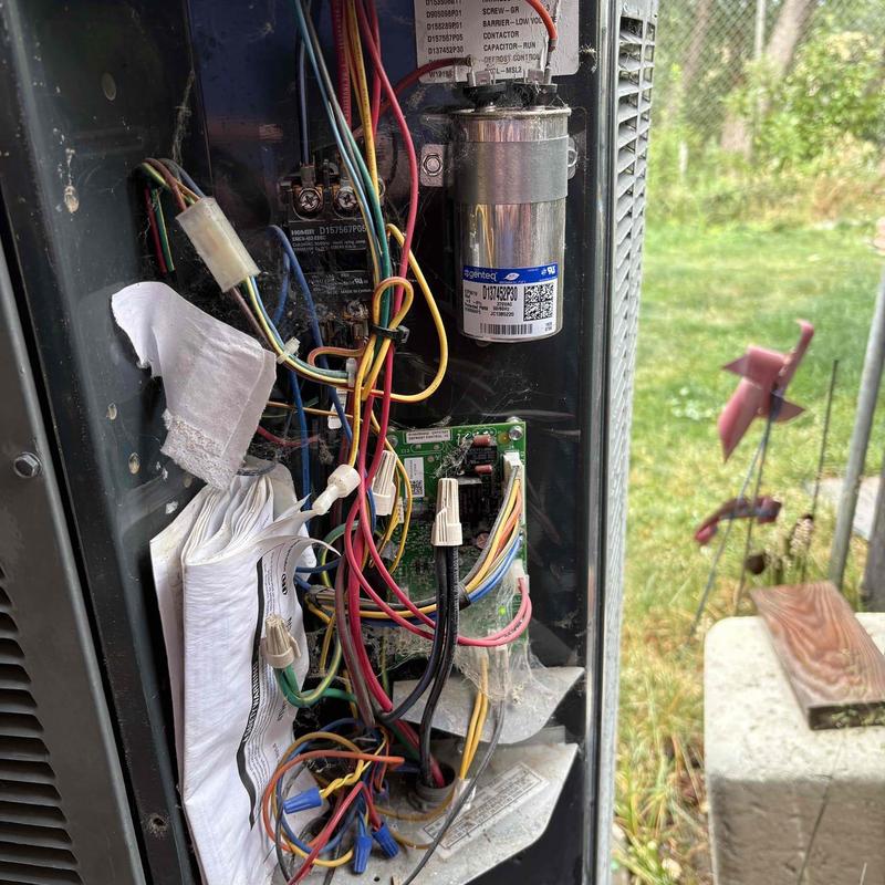 Heat pump capacitor and wiring inside unit panel