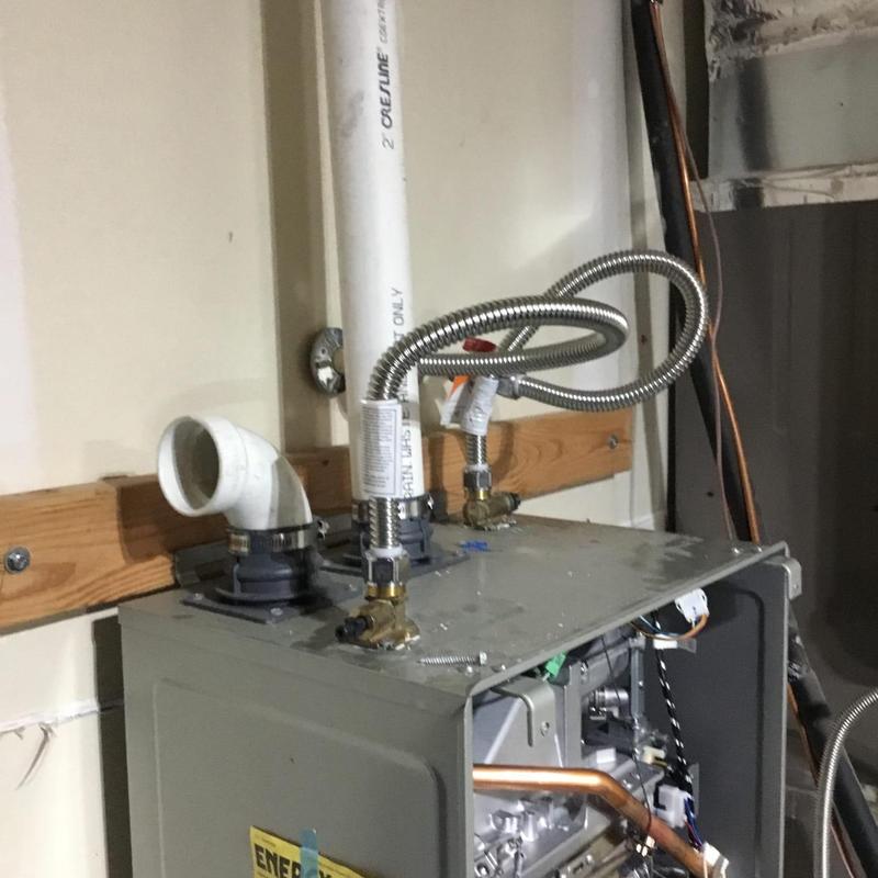 Water heater flow sensor reset with flexible piping