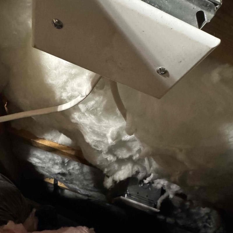Floor outlet installation with wiring in wall insulation