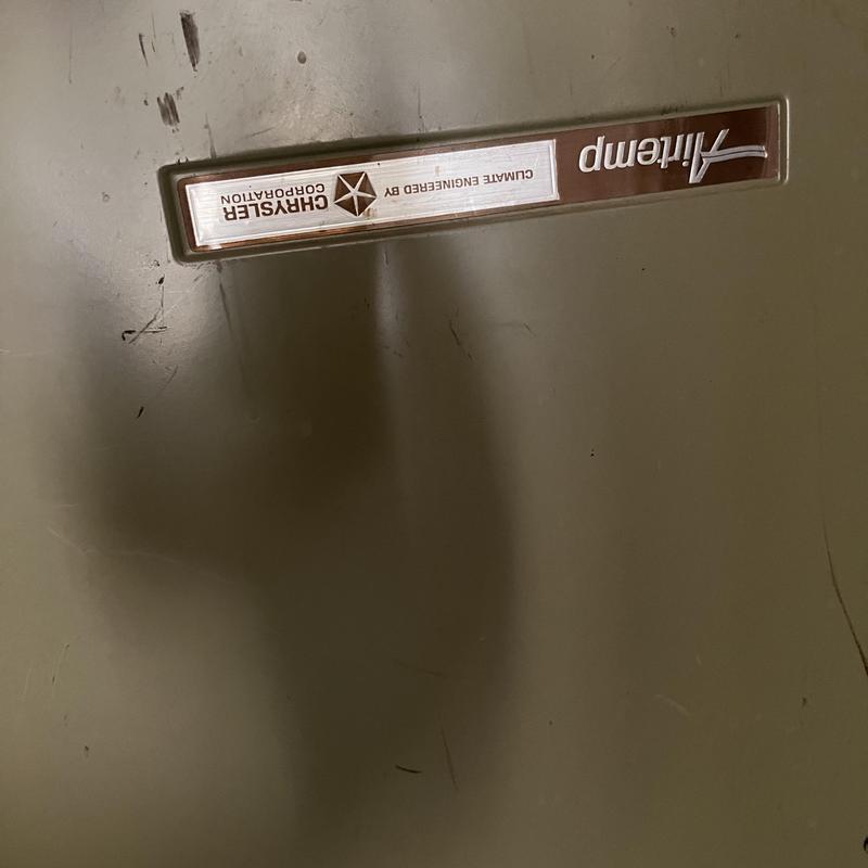 Heat pump unit label on HVAC system panel
