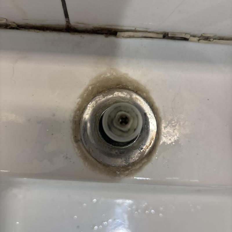Faucet valve stem with mineral buildup and grime